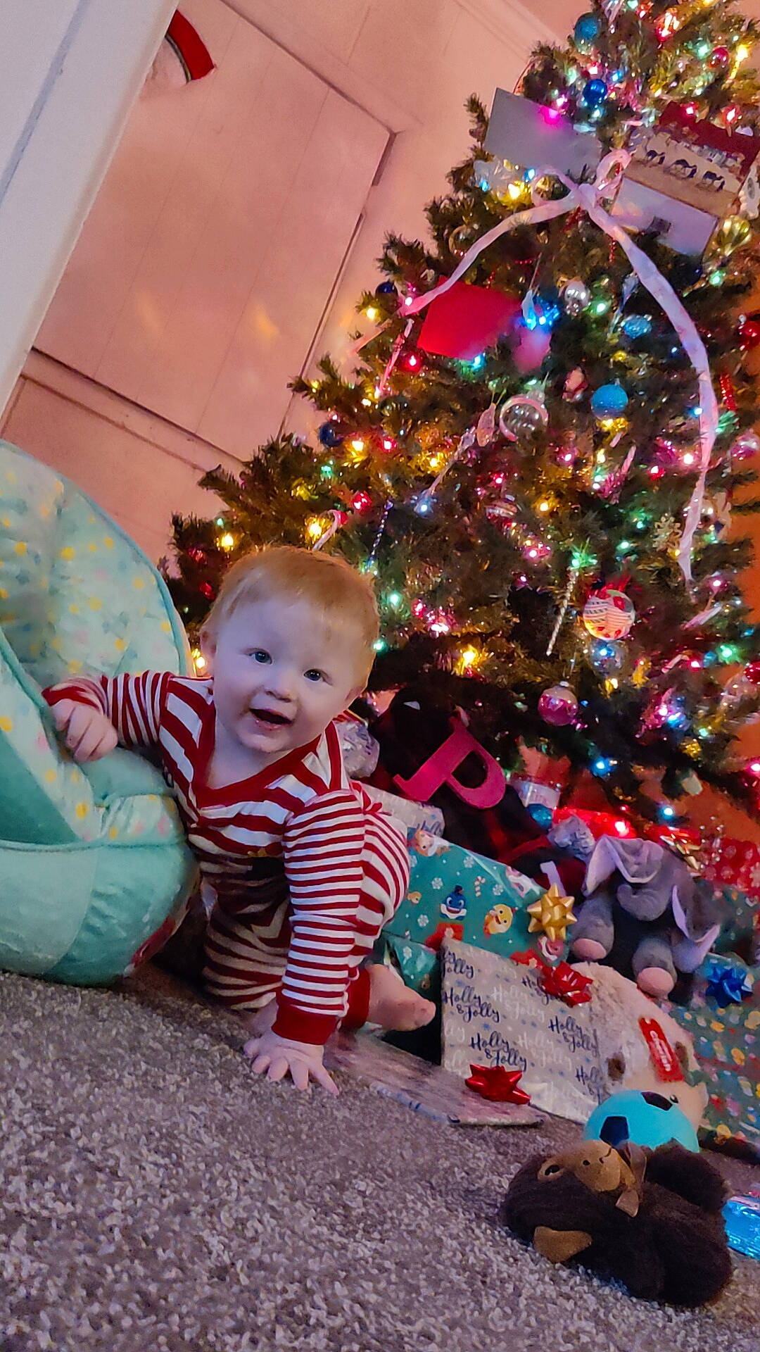 Caiden joined the competition — help win amazing prizes! baby, baby_toddler_clothing, child, christmas, christmas_decoration, christmas_eve, christmas_ornament, christmas_tree, event, evergreen, fun, happy, holiday, holiday_ornament, ornament, person, room, smile, toddler, toy