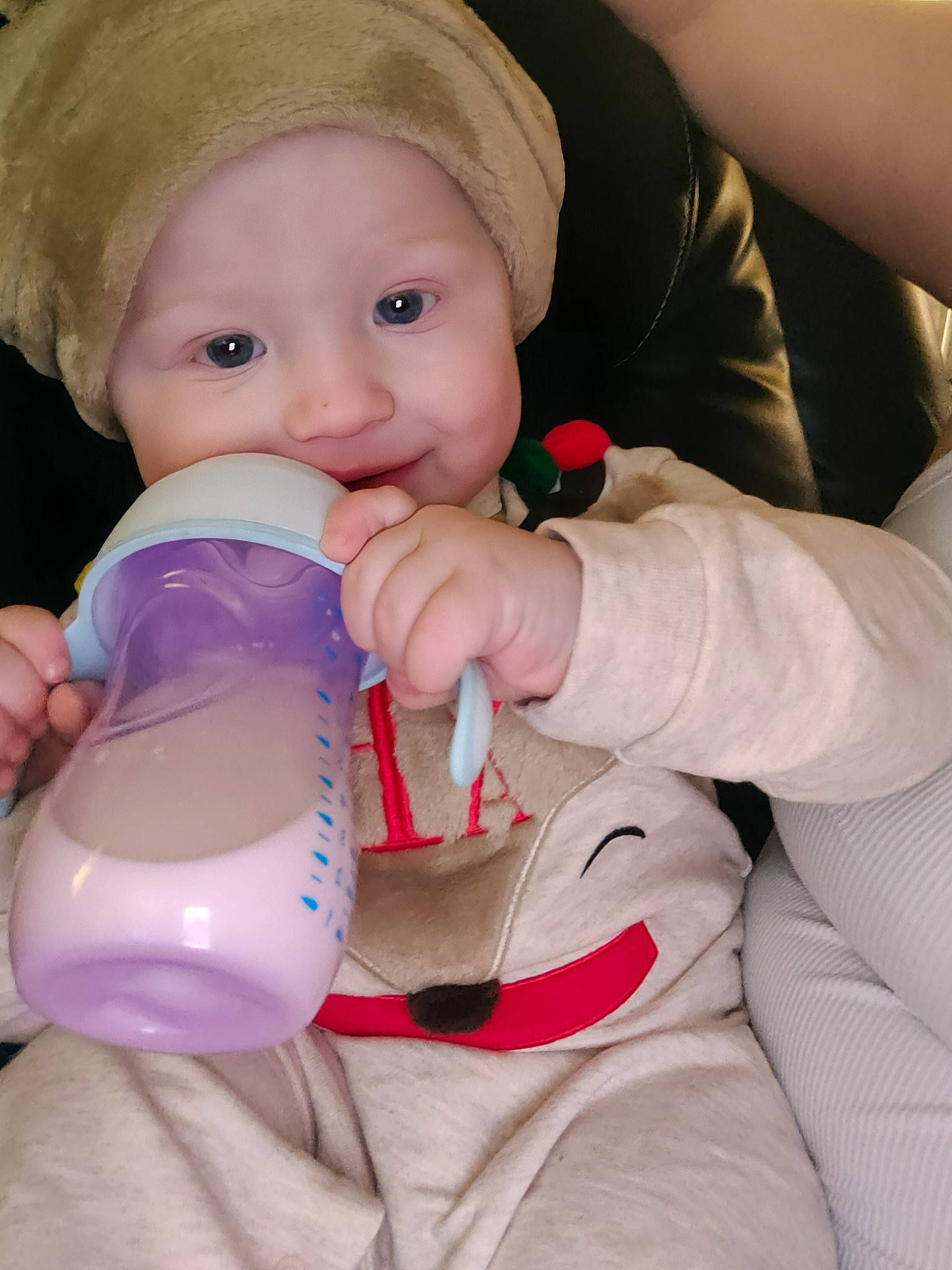 Caiden joined the competition — help win amazing prizes! arm, baby, baby_bottle, baby_products, baby_toddler_clothing, bottle, cap, cheek, child, drinkware, finger, hand, headwear, human_body, nail, person, plastic_bottle, skin, sleeve, thumb