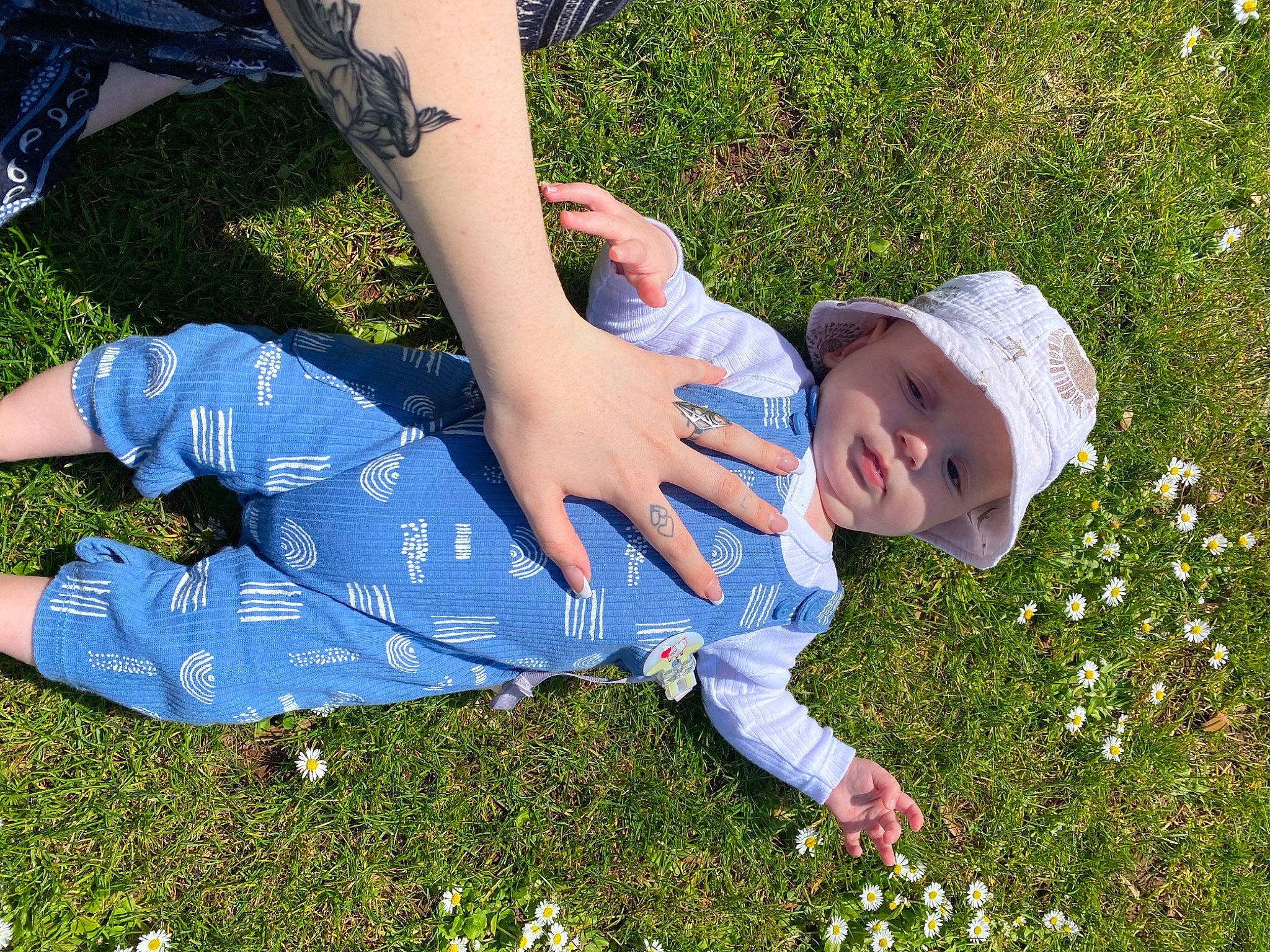 Marley joined the competition — help win amazing prizes! baby, baby_toddler_clothing, botany, child, electric_blue, flower, fun, grass, grass_family, groundcover, happy, hat, headwear, lawn, leaf, leisure, meadow, people_in_nature, person, plant