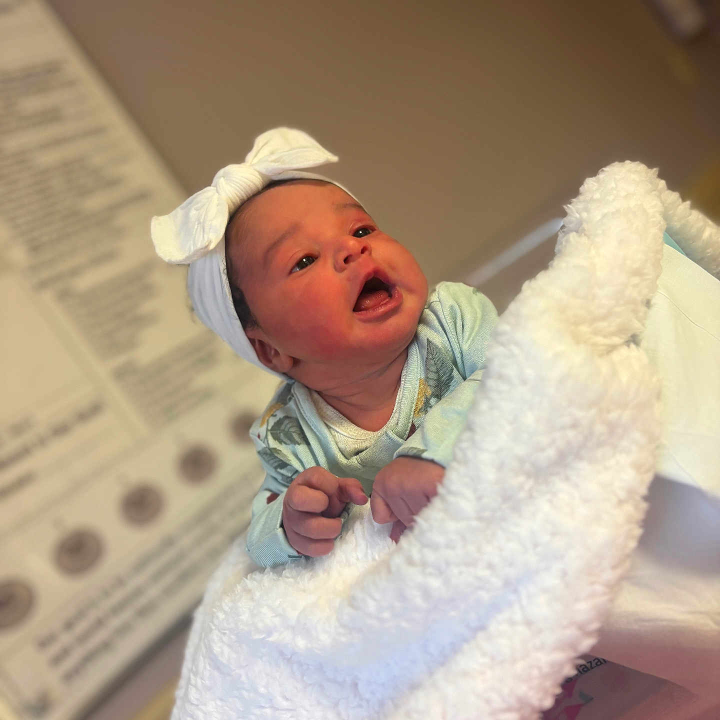 Jakiylah joined the competition — help win amazing prizes! baby, blanket, child, clothing, cozy, curious, cute, expression, fluffy, headband, indoors, infant, lying_down, newborn, portrait, small_hands, soft_focus, warm, white_bow, wrapped