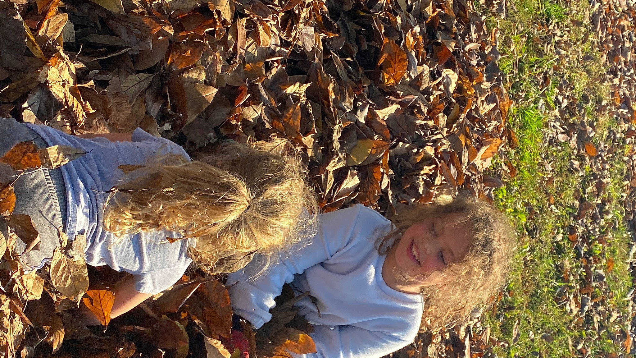 Abigail is registered to the contest to win money with this photo: fun, grass, happy, joy, leisure, people_in_nature, person, plant, smile, soil, toddler