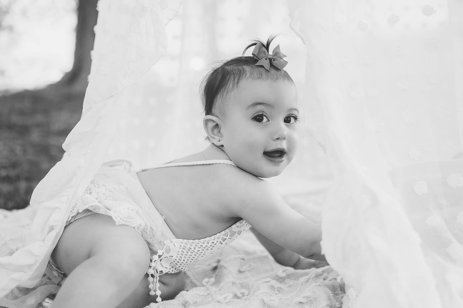 Alaia joined the competition — help win amazing prizes! baby, black_and_white, bridal_accessory, bridal_clothing, child, event, eye, flash_photography, fun, gesture, hair_accessory, happy, headpiece, laugh, monochrome, monochrome_photography, people_in_nature, person, smile, style