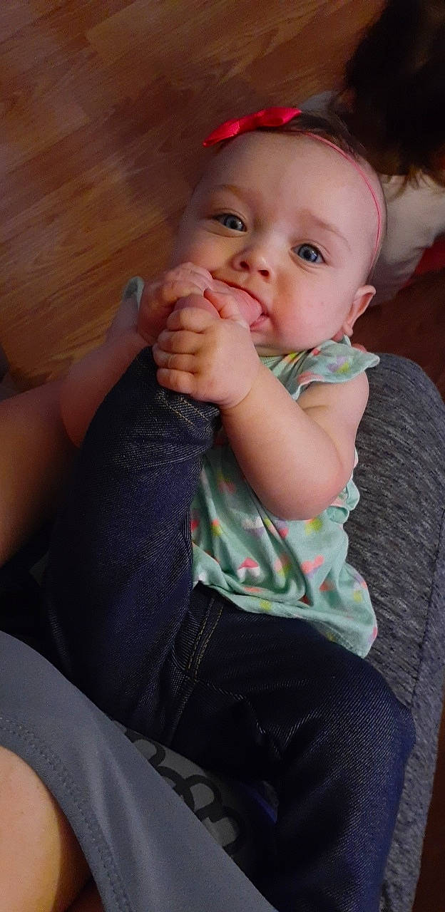 Keira joined the competition — help win amazing prizes! arm, baby, cheek, child, chin, eye, finger, mouth, nose, person, sitting, skin, thumb, toddler