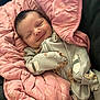 baby, newborn, smiling, blanket, pink, onesie, sleeping, face, infant, cute, cozy, child, soft, fabric, pattern, resting, comfort, portrait, indoor, clothing