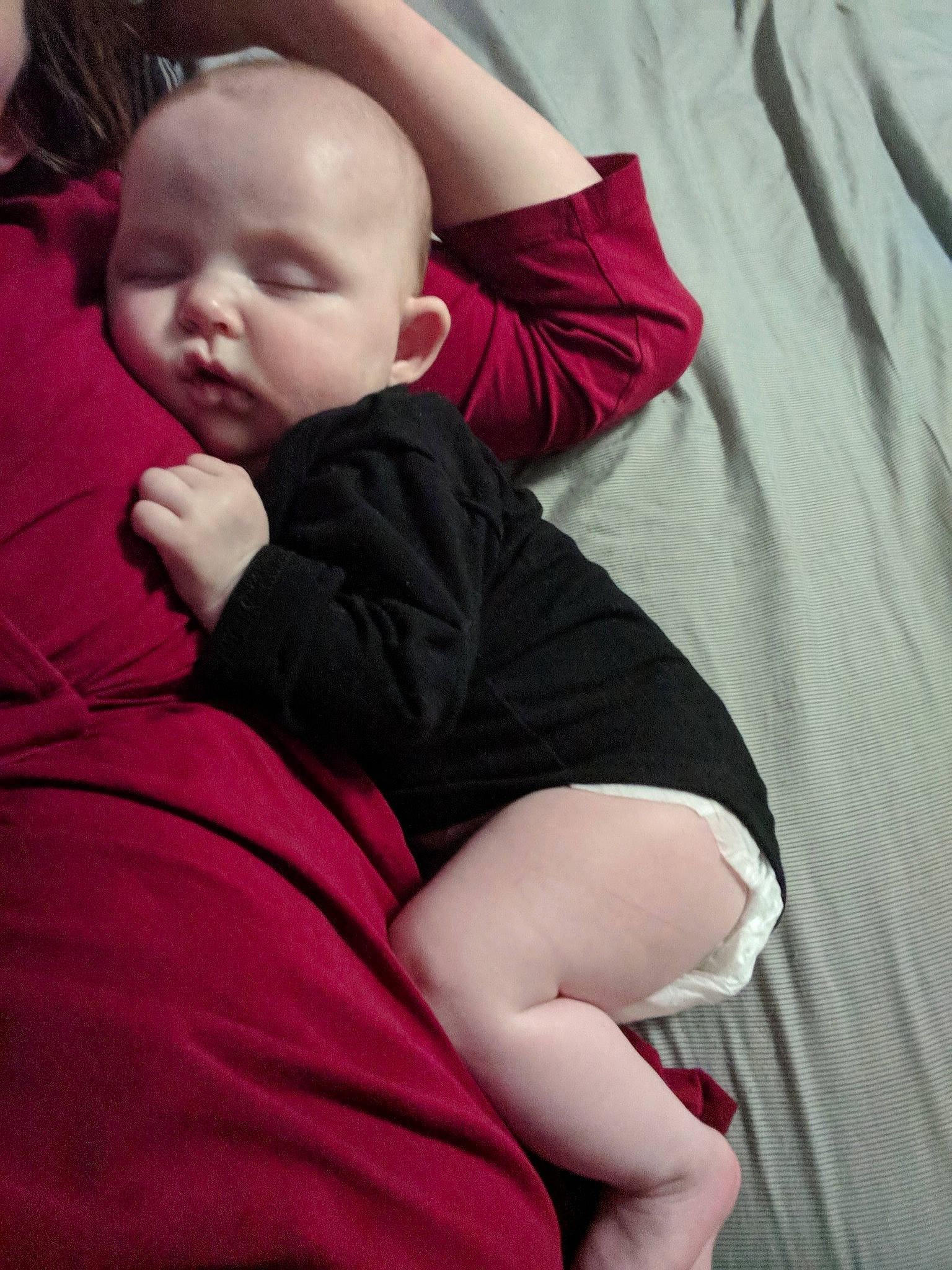 Quinn joined the competition — help win amazing prizes! arm, baby, cheek, child, comfort, leg, nap, person, red, sitting, sleep, toddler