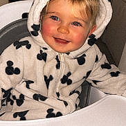 Isaac a rejoint le concours — aidez-le/la à gagner de superbes lots ! child, toddler, hoodie, mickey_mouse, black_and_white, high_chair, smiling, indoors, face, red_eye, happy, blond_hair, zipper, cozy, cute, person, clothing, seated, baby, portrait