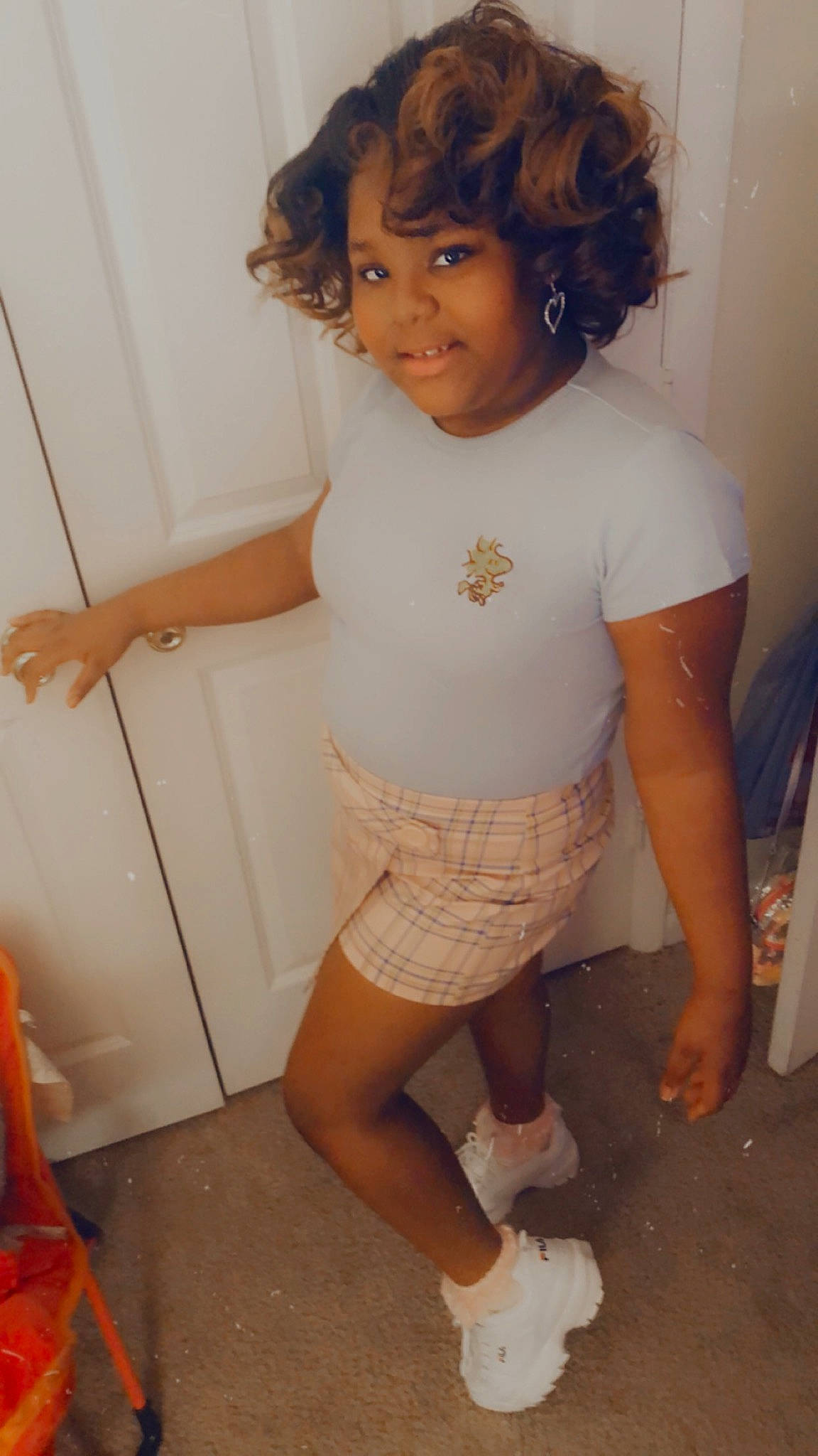 Leah is registered to the contest to win money with this photo: arm, black_hair, cool, face, hairstyle, happy, joint, knee, leg, lip, mouth, organ, person, shoulder, skin, sleeve, smile, standing, stomach, thigh