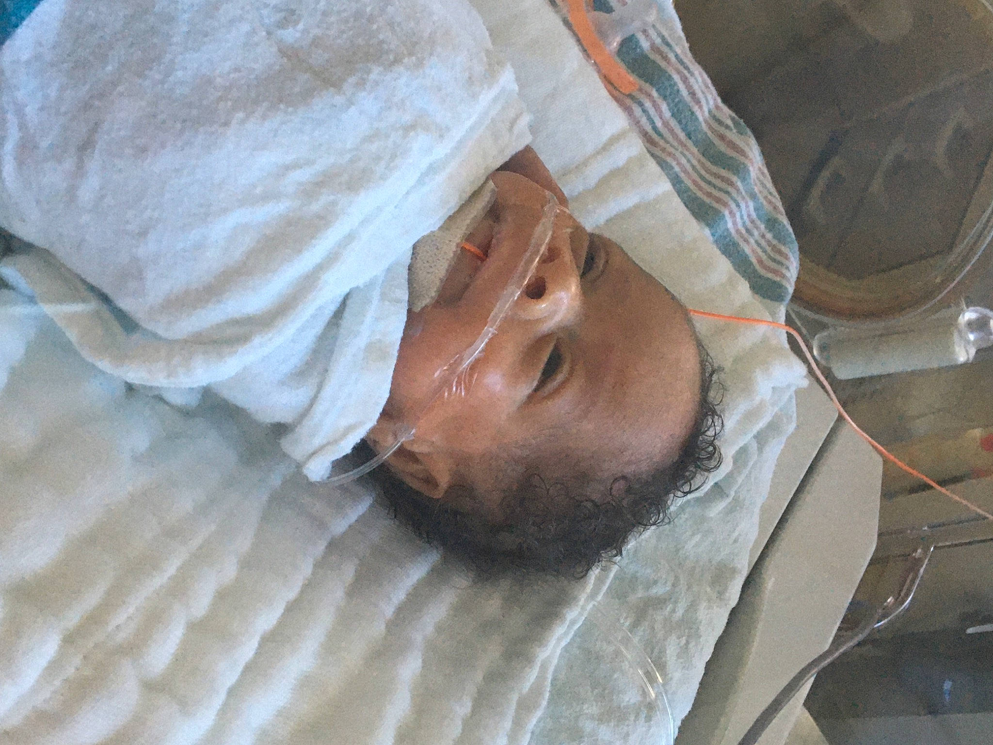 Avalon is registered to the contest to win money with this photo: bed_sheet, bedding, blanket, child, childbirth, comfort, flesh, hospital, linens, nap, person, room, service, sleep, vehicle_door, windshield, wood, wrinkle