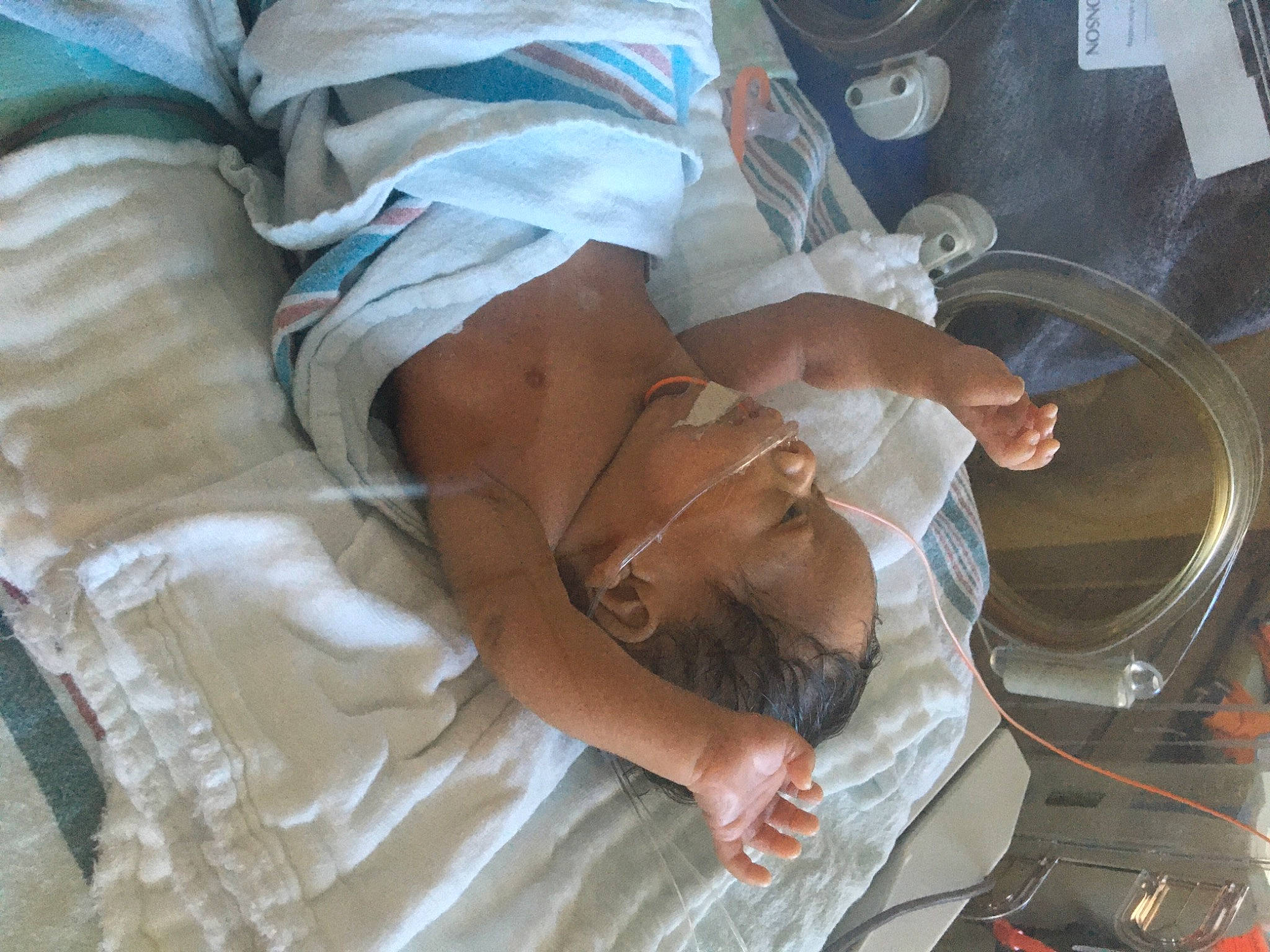 Avalon is registered to the contest to win money with this photo: auto_part, automotive_tire, automotive_wheel_system, baby, child, comfort, cooking, elbow, event, hat, human_leg, knee, linens, patient, person, rim, service, shorts, smile, thigh