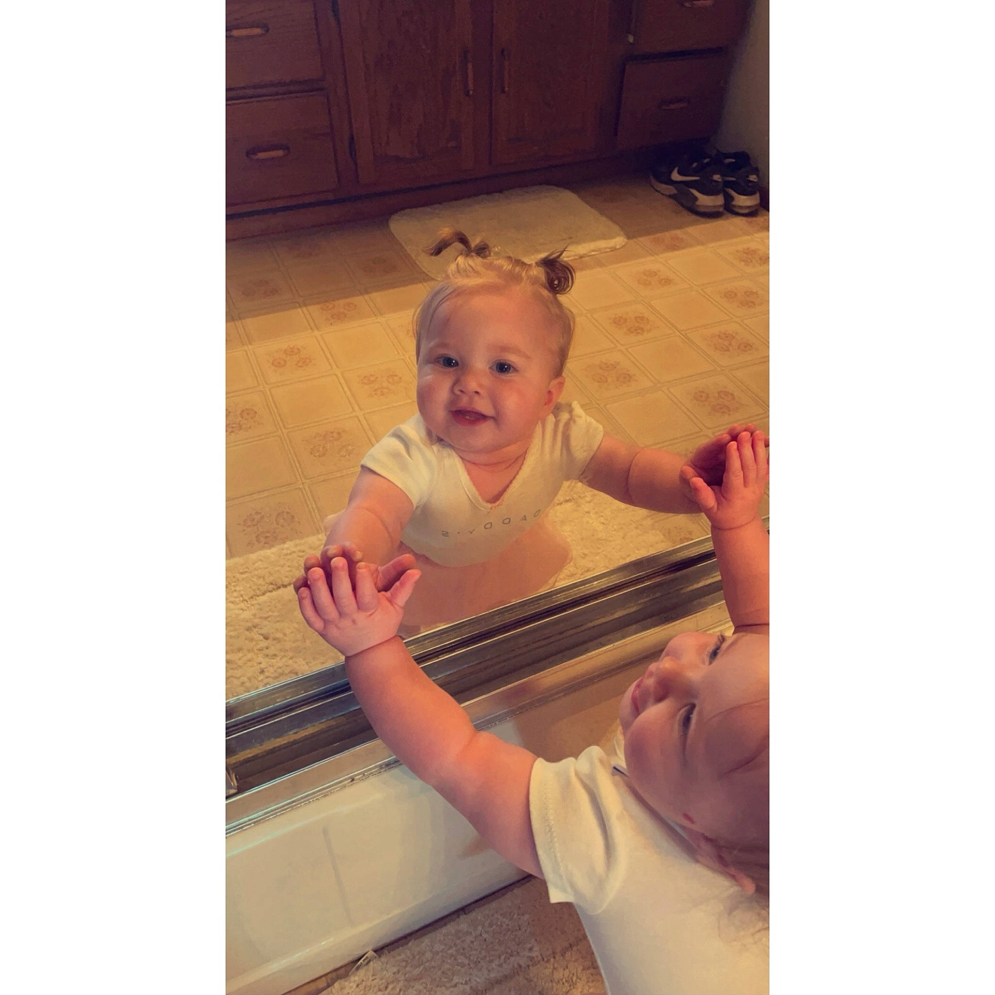 Lydia joined the competition — help win amazing prizes! baby, baby_products, baby_toddler_clothing, cabinetry, comfort, cupboard, eyewear, face, flooring, happy, hardwood, metal, person, play, room, sitting, sleeve, smile, t_shirt, toddler