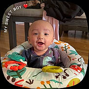 Kylan joined the competition — help win amazing prizes! baby, boy, smiling, nike, baby_seat, colorful, toy, happy, indoor, floor, furniture, clothing, face, infant, portrait, cute, child, seat, expression, home