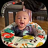 baby, boy, smiling, nike, baby_seat, colorful, toy, happy, indoor, floor, furniture, clothing, face, infant, portrait, cute, child, seat, expression, home