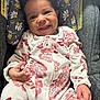 Aaliyah joined the competition — help win amazing prizes! baby, car_seat, child, clothing, comfort, cushion, cute, face, floral_pattern, hand, happy, indoors, infant, onesie, person, pink, portrait, seat, smiling, young_child