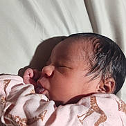 Nayeli joined the competition — help win amazing prizes! newborn, baby, sleeping, pink_clothing, giraffe_print, infant, face, closed_eyes, soft_light, bed, blanket, cute, peaceful, resting, skin, hair, portrait, one_person, indoors, child