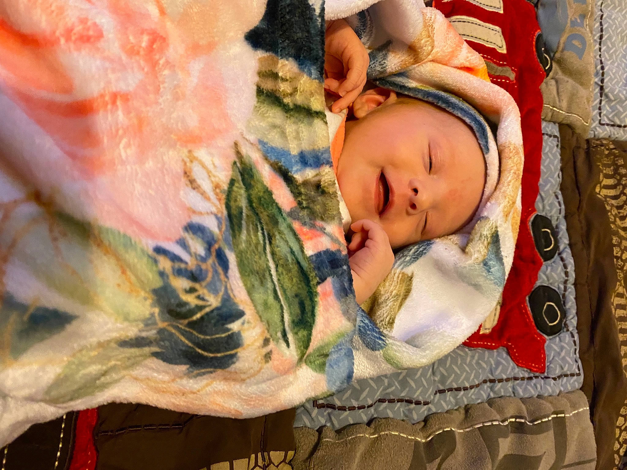 Lucille is registered to the contest to win money with this photo: art, baby, baby_products, baby_sleeping, baby_toddler_clothing, bedding, cheek, child, comfort, doll, eye, eyelash, headgear, headwear, human_body, iris, linens, person, room, textile