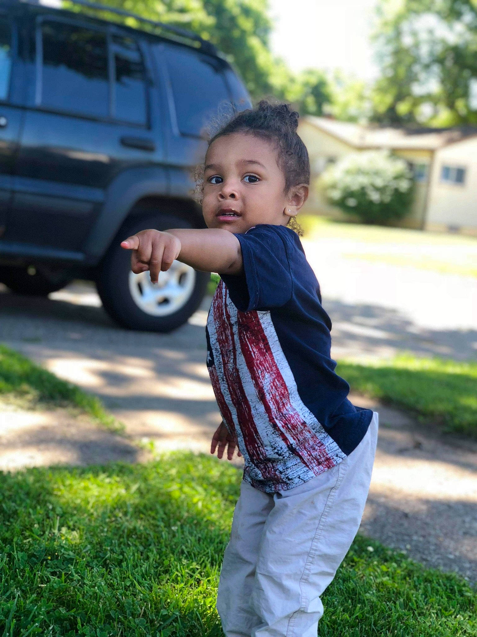 Izaiah is registered to the contest to win money with this photo: car, child, family_car, grass, luxury_vehicle, person, photography, plant, toddler, vacation, vehicle, vehicle_door