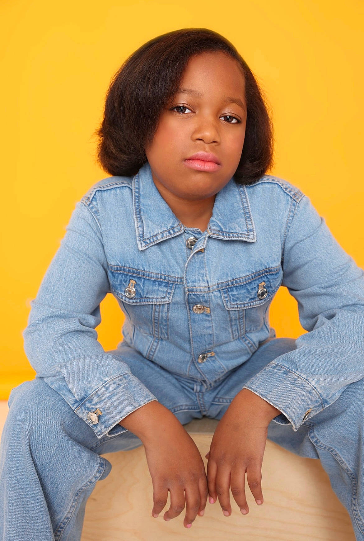 Justyce joined the competition — help win amazing prizes! black_hair, cheek, chin, collar, denim, dress_shirt, electric_blue, flash_photography, human_body, jeans, leg, long_hair, neck, pattern, person, shoulder, sitting, skin, sleeve, t_shirt