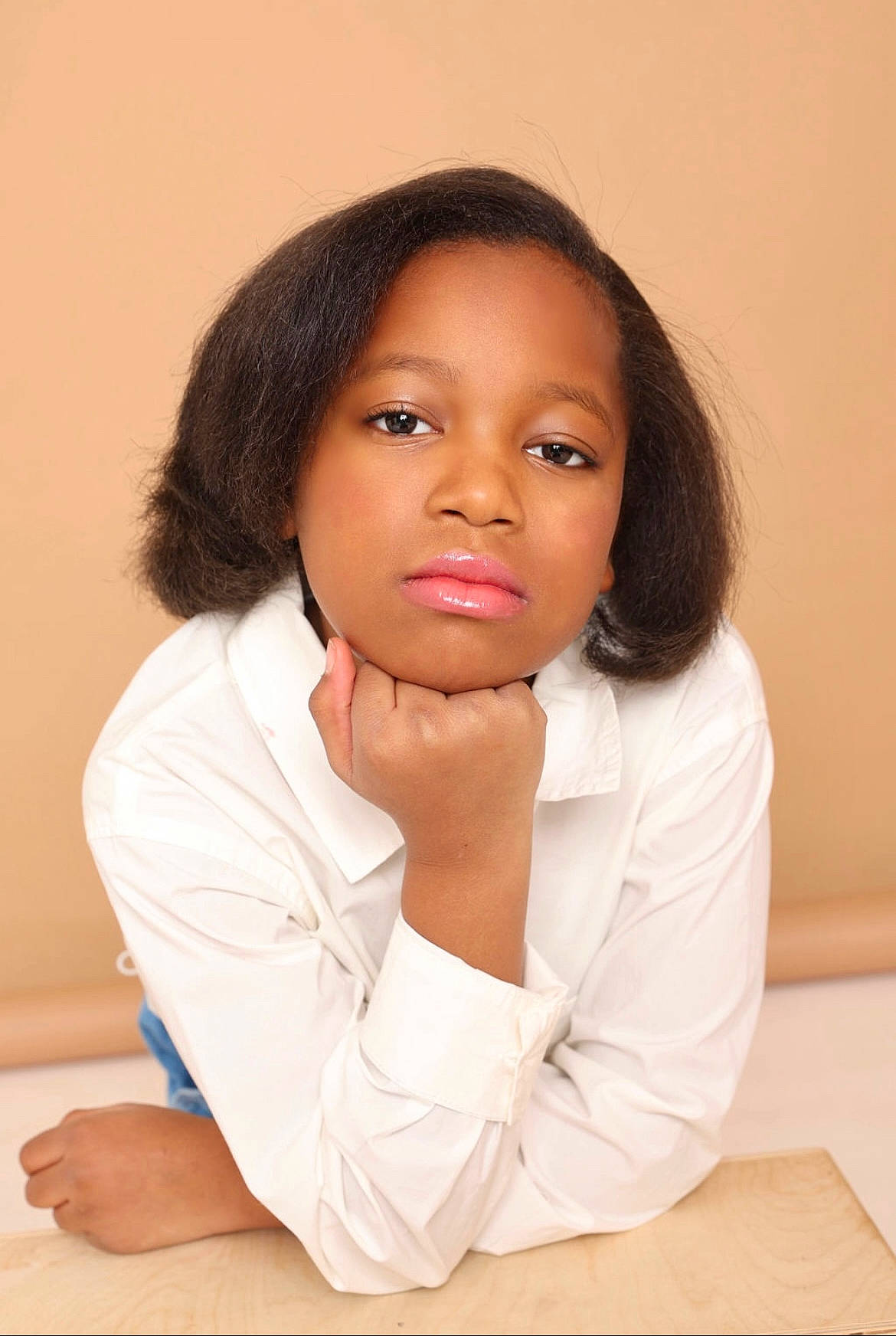 Justyce joined the competition — help win amazing prizes! black_hair, brown_hair, cheek, collar, eyelash, fashion_model, flash_photography, forehead, gesture, jaw, layered_hair, lip, lipstick, long_hair, neck, nose, person, skin, sleeve, table