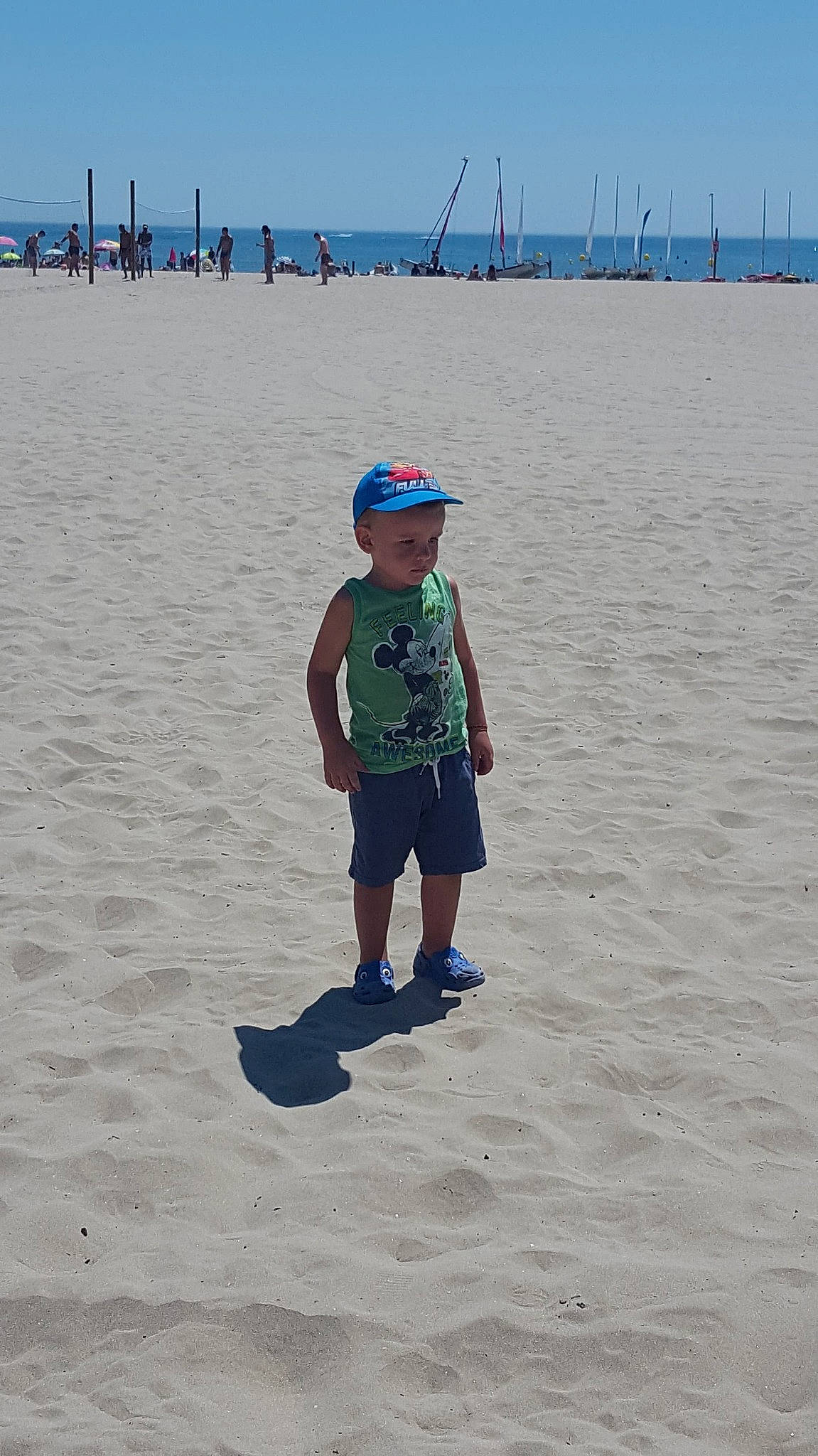 Logan a rejoint le concours — aidez-le/la à gagner de superbes lots ! beach, body_of_water, cloud, coast, coastal_and_oceanic_landforms, fun, headgear, headwear, male, material, ocean, person, recreation, sand, sea, shore, sky, summer, tourism, vacation