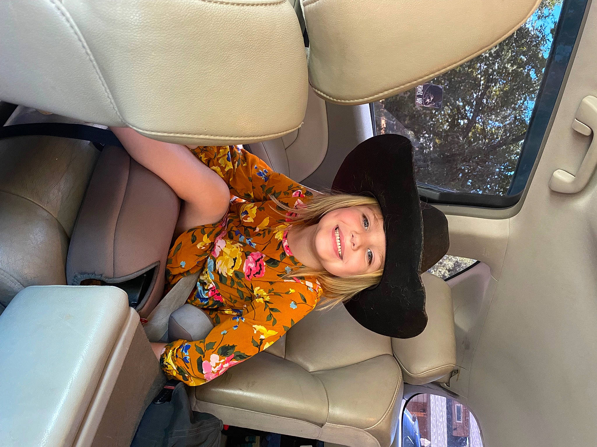 Copelynn is registered to the contest to win money with this photo: auto_part, automotive_design, automotive_exterior, automotive_lighting, car, car_seat, car_seat_cover, comfort, head_restraint, headwear, joy, mode_of_transport, motor_vehicle, person, personal_luxury_car, seat_belt, smile, steering_wheel, toddler, vehicle