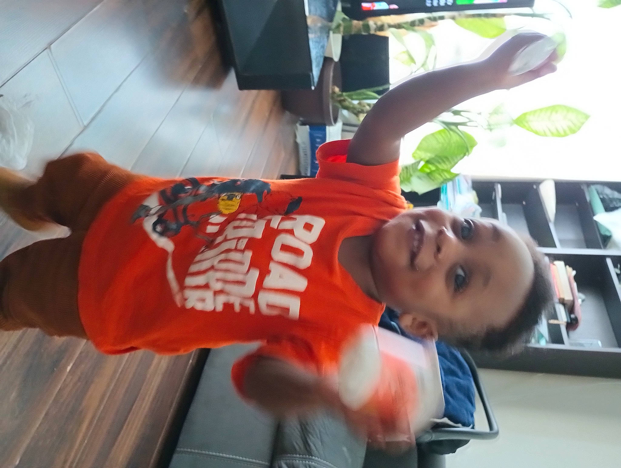 Gate is registered to the contest to win money with this photo: child, elbow, exercise, flooring, fun, human_leg, joy, knee, leisure, person, physical_fitness, recreation, shorts, sleeve, sportswear, t_shirt