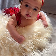Arzugul joined the competition — help win amazing prizes! baby, infant, red_headband, red_dress, fluffy_rug, soft_texture, curious_expression, indoor, portrait, child, cute, lying_down, headband, lace, closeup, adorable, person, human, skin, face