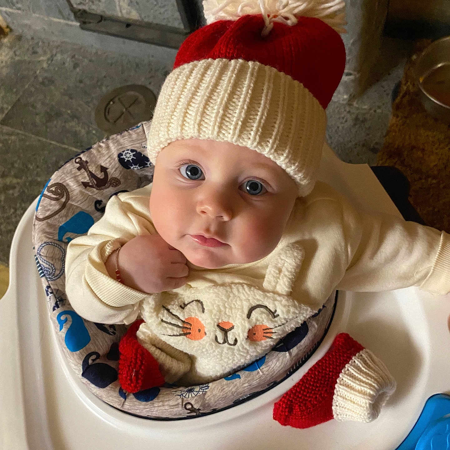 Hayzell is registered to the contest to win money with this photo: baby, beanie, bodypart, bonnet, cap, clothing, cutlery, dish, eating, face, finger, food, hand, hat, head, meal, person, photography, portrait, spoon