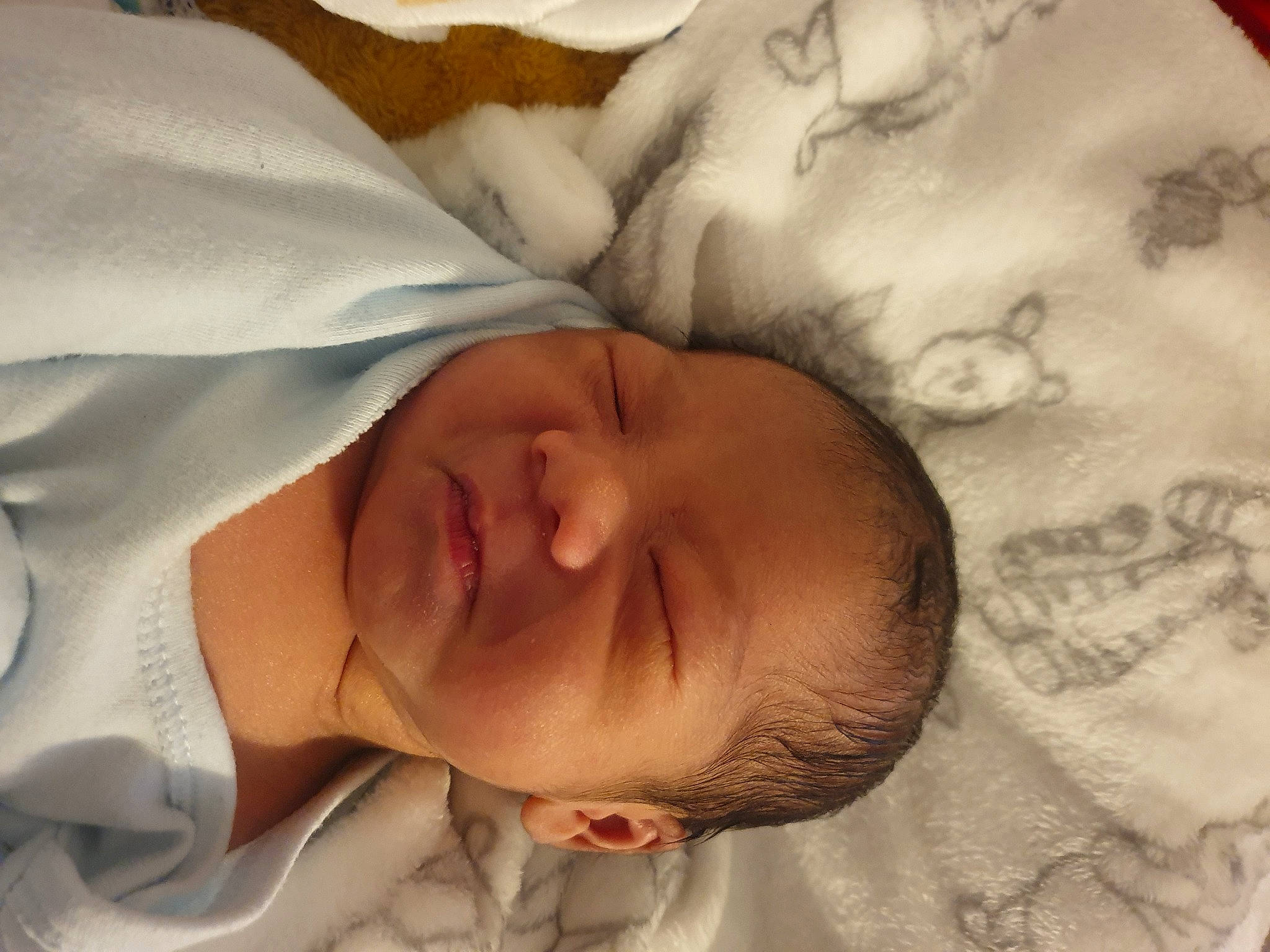 Carlos is registered to the contest to win money with this photo: baby, baby_sleeping, baby_toddler_clothing, bedtime, cheek, child, comfort, eyebrow, forehead, happy, human_body, iris, linens, lip, mouth, nose, person, skin, smile, toddler