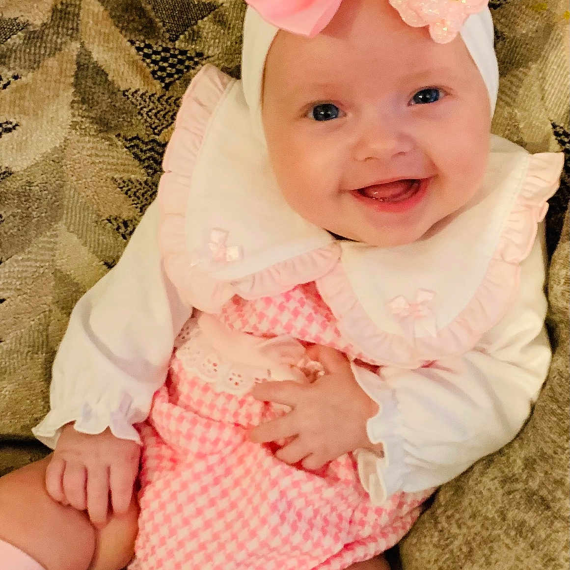 Valentina-Marie joined the competition — help win amazing prizes! baby, cheerful, child, clothing, couch, cute, face, hand, happy, headband, indoors, infant, pink_bow, pink_outfit, portrait, sitting, smiling, sock, texture, white_collar