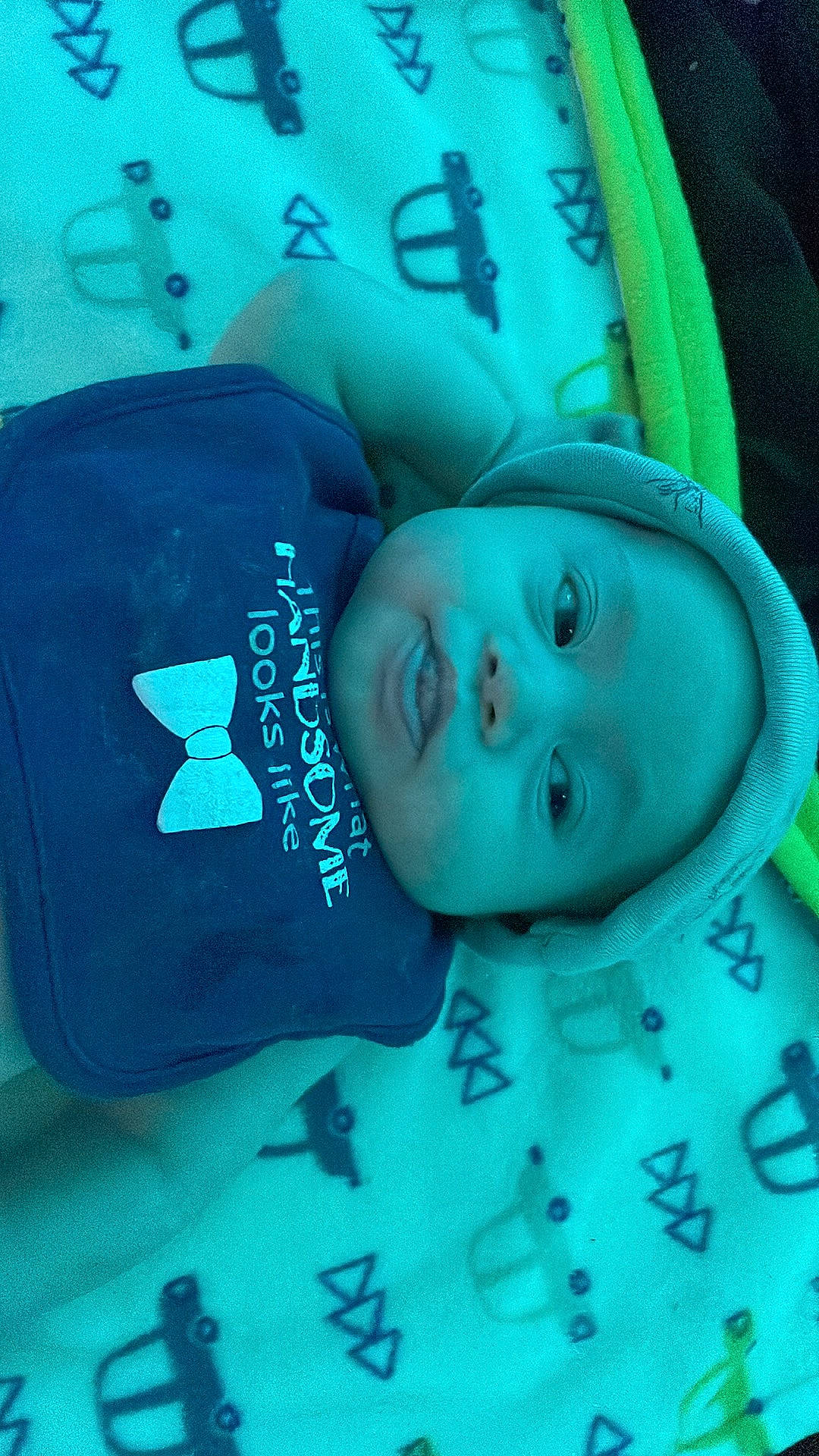 Dakota is registered to the contest to win money with this photo: aqua, azure, baby, blue, child, circle, electric_blue, green, hat, organism, pattern, person, snapshot, toddler, water