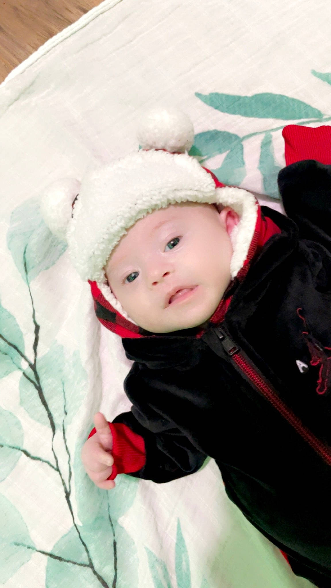 Dakota is registered to the contest to win money with this photo: baby, baby_toddler_clothing, beanie, cap, cheek, comfort, event, eye, freezing, fun, fur, happy, headwear, hood, knit_cap, magenta, parka, person, snow, textile