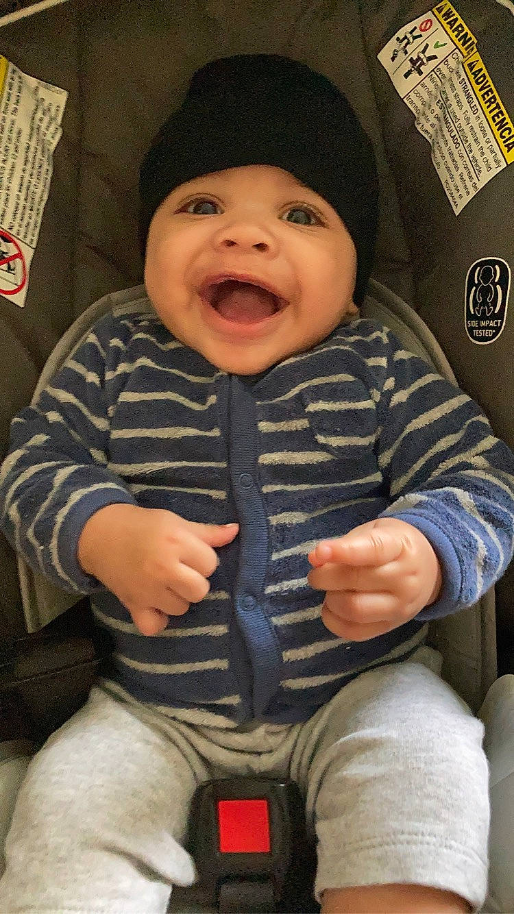Demarieo joined the competition — help win amazing prizes! baby, baby_toddler_clothing, cap, cheek, chin, comfort, eye, face, facial_expression, finger, happy, headwear, mouth, nose, outerwear, person, skin, sleeve, smile, standing