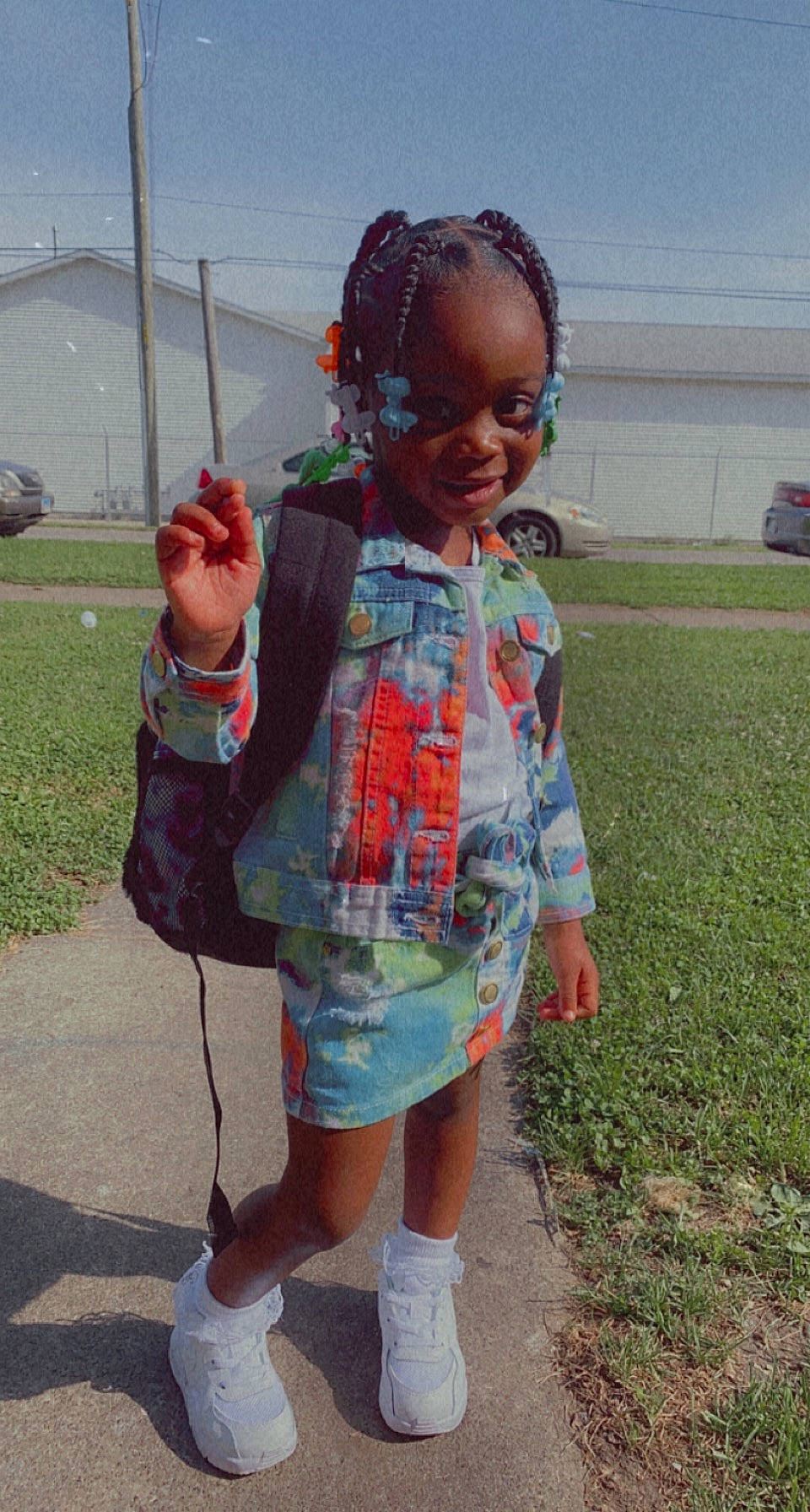 Jakiyah joined the competition — help win amazing prizes! baby_toddler_clothing, child, fashion_accessory, fun, grass, hair, happy, human_leg, pattern, people, person, plant, public_space, sky, sleeve, smile, sock, spring, summer, t_shirt