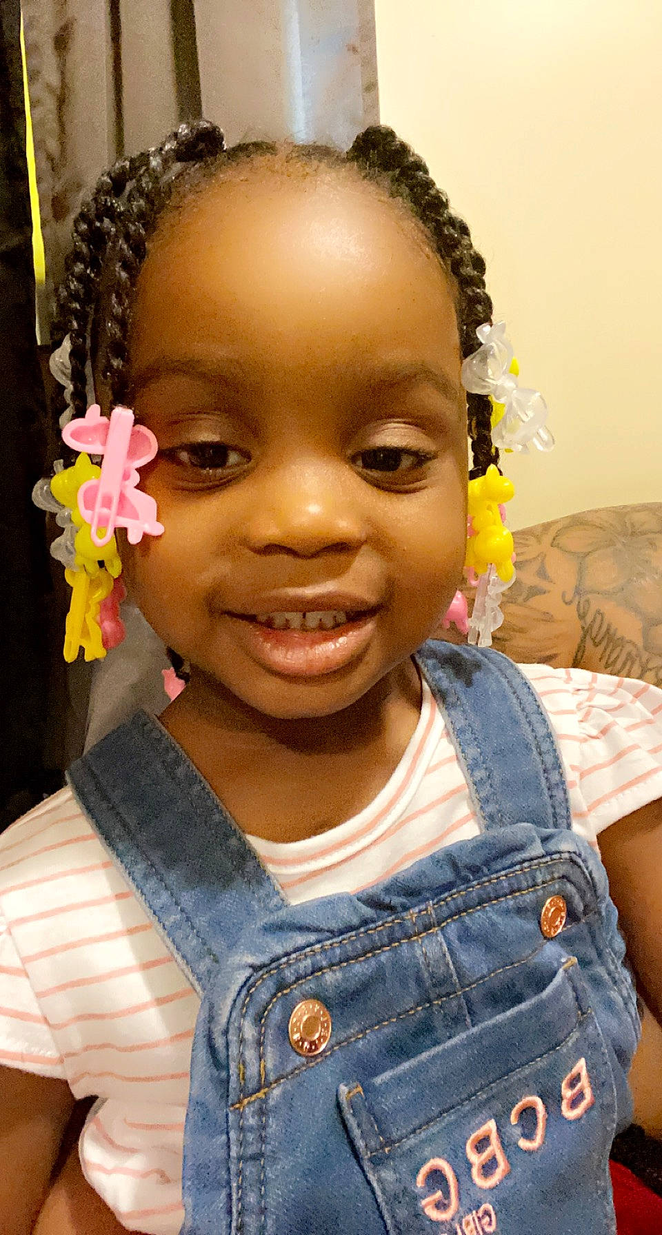 Jakiyah joined the competition — help win amazing prizes! black, black_hair, cheek, child, flower, forehead, fun, hair, hairstyle, happy, head, human, iris, joy, lip, nose, person, petal, pillow, skin