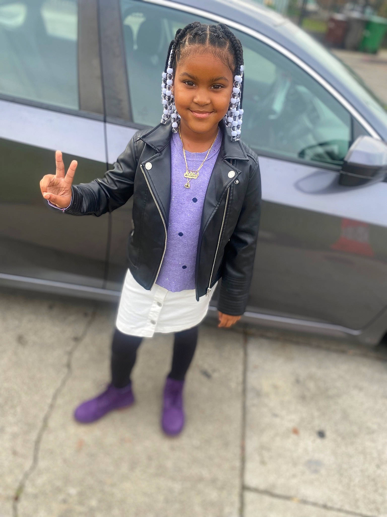 Kylee joined the competition — help win amazing prizes! alloy_wheel, auto_part, automotive_design, automotive_exterior, automotive_wheel_system, blazer, car, electric_blue, footwear, formal_wear, joy, motor_vehicle, person, personal_luxury_car, plant, shoe, smile, street_fashion, suit, vehicle