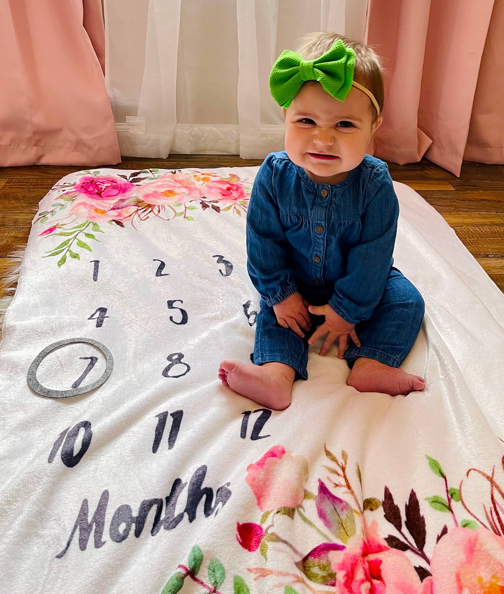Aubrey is registered to the contest to win money with this photo: arm, baby_toddler_clothing, dress, face, fashion, finger, green, hand, happy, headwear, leaf, person, pink, plant, product, red, skin, sleeve, t_shirt, textile