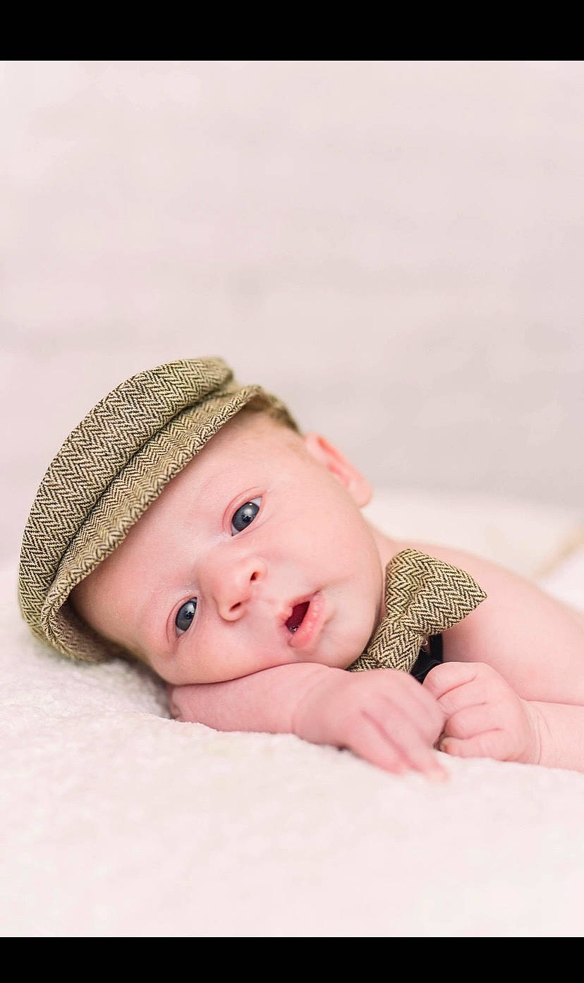 Jalen joined the competition — help win amazing prizes! baby, baby_toddler_clothing, cap, cheek, child, comfort, eye, eyebrow, fashion_accessory, flash_photography, happy, hat, head, headwear, knit_cap, linens, lip, pattern, person, skin