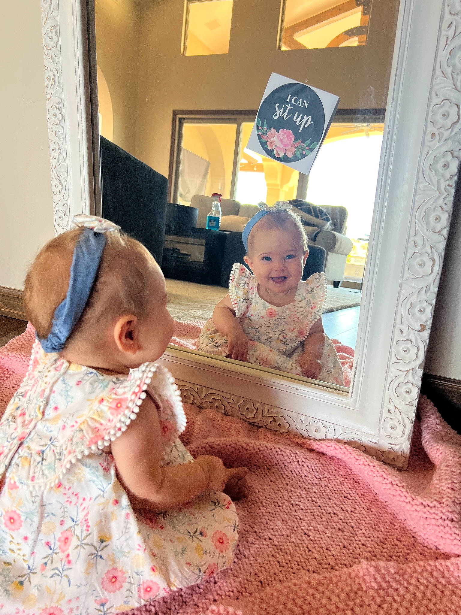 Grace joined the competition — help win amazing prizes! baby, baby_toddler_clothing, chair, child, comfort, couch, flooring, fun, happy, joy, linens, living_room, pattern, person, picture_frame, room, sitting, sleeve, smile, t_shirt