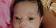 Tay'Lynn joined the competition — help win amazing prizes! baby, infant, face, eyes, bottle, pink, yellow, blanket, heart_pattern, skin, closeup, cute, child, feeding, head, soft, texture, indoors, portrait, newborn