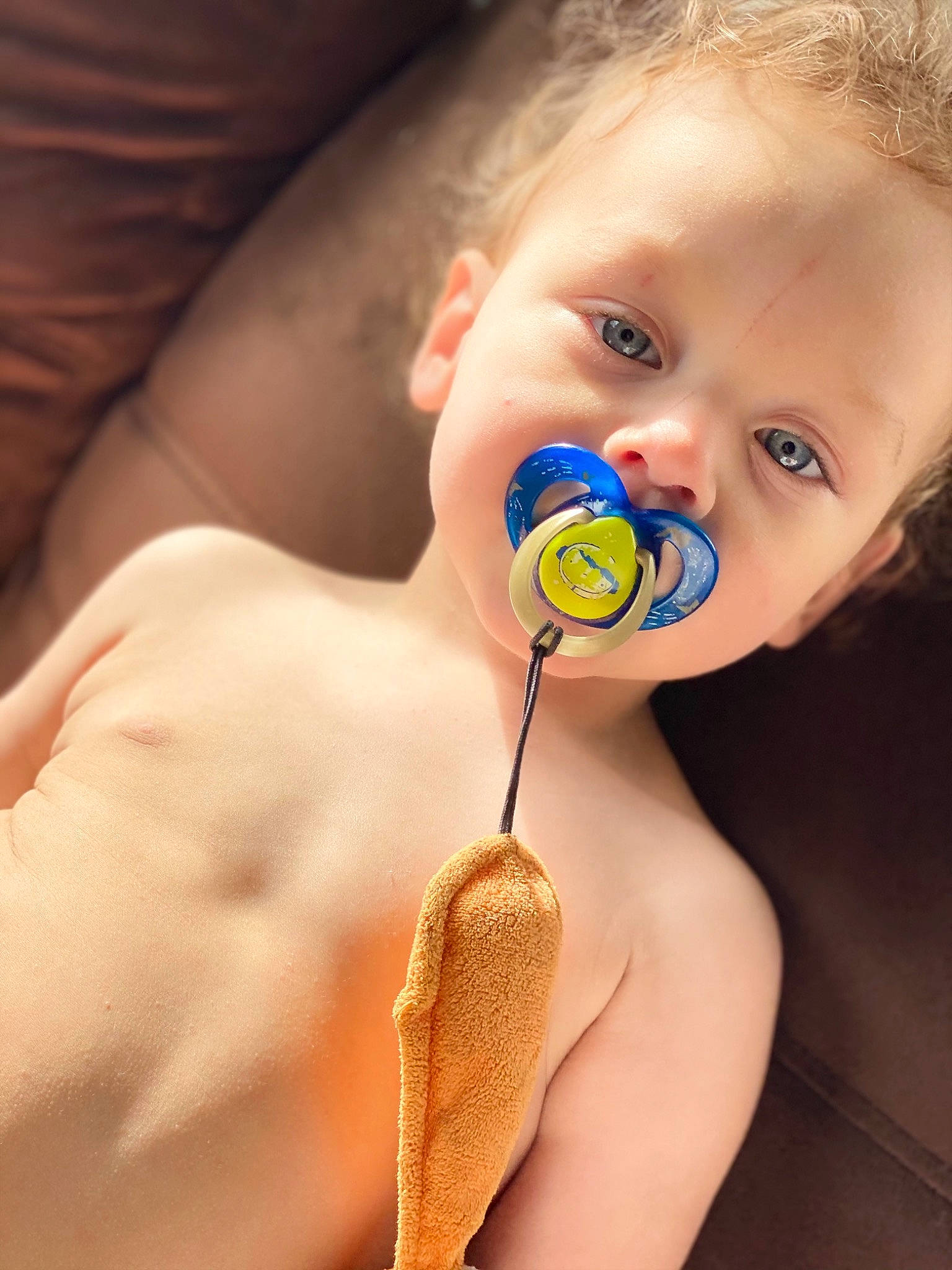 Milo is registered to the contest to win money with this photo: baby, baby_toddler_clothing, body_jewelry, cheek, chin, close_up, ear, electric_blue, eyebrow, eyelash, facial_expression, fun, happy, lip, mouth, nail, neck, nose, person, skin