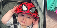 Leo joined the competition — help win amazing prizes! baby, child, stroller, hat, spiderman, clothing, shopping, floor, wood, straps, seat, cute, infant, person, face, apparel, retail, hands, cap, blue_eyes
