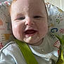 Leo joined the competition — help win amazing prizes! baby, child, face, high_chair, smile, food, messy, clothing, infant, happy, indoor, straps, red_hair, cheeks, teeth, feeding, person, closeup, seat, background
