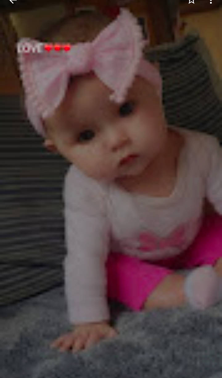 Haisley is registered to the contest to win money with this photo: art, baby, baby_toddler_clothing, cheek, child, craft, creative_arts, dress, embellishment, fashion_accessory, fur, hair_accessory, headband, headwear, magenta, pattern, peach, person, pink, sleeve