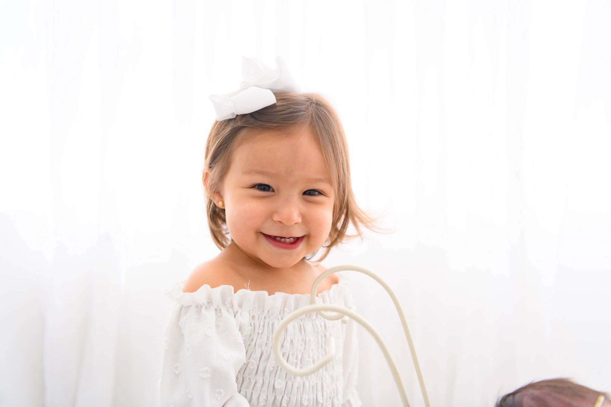 Emery joined the competition — help win amazing prizes! baby_toddler_clothing, brown_hair, dress, event, eyebrow, eyelash, face, fashion_accessory, flash_photography, hair_accessory, happy, hat, headgear, headpiece, iris, joy, neck, person, skin, sleeve