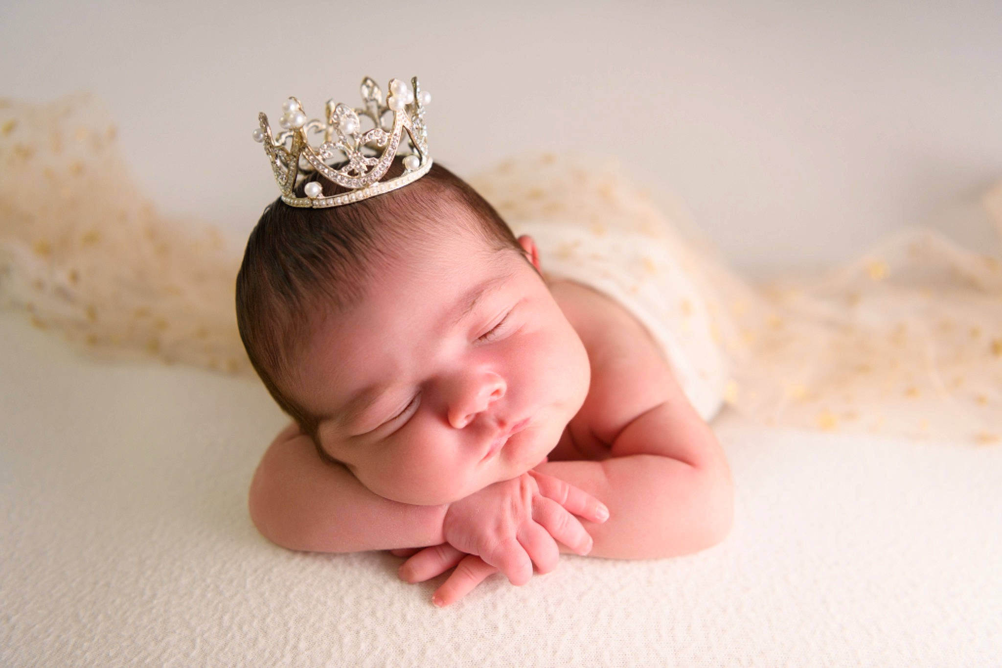 Ellie is registered to the contest to win money with this photo: baby, baby_sleeping, baby_toddler_clothing, body_jewelry, child, comfort, crown, fashion_accessory, finger, hair_accessory, hand, happy, headband, headgear, headpiece, jewellery, person, skin, tiara, toddler
