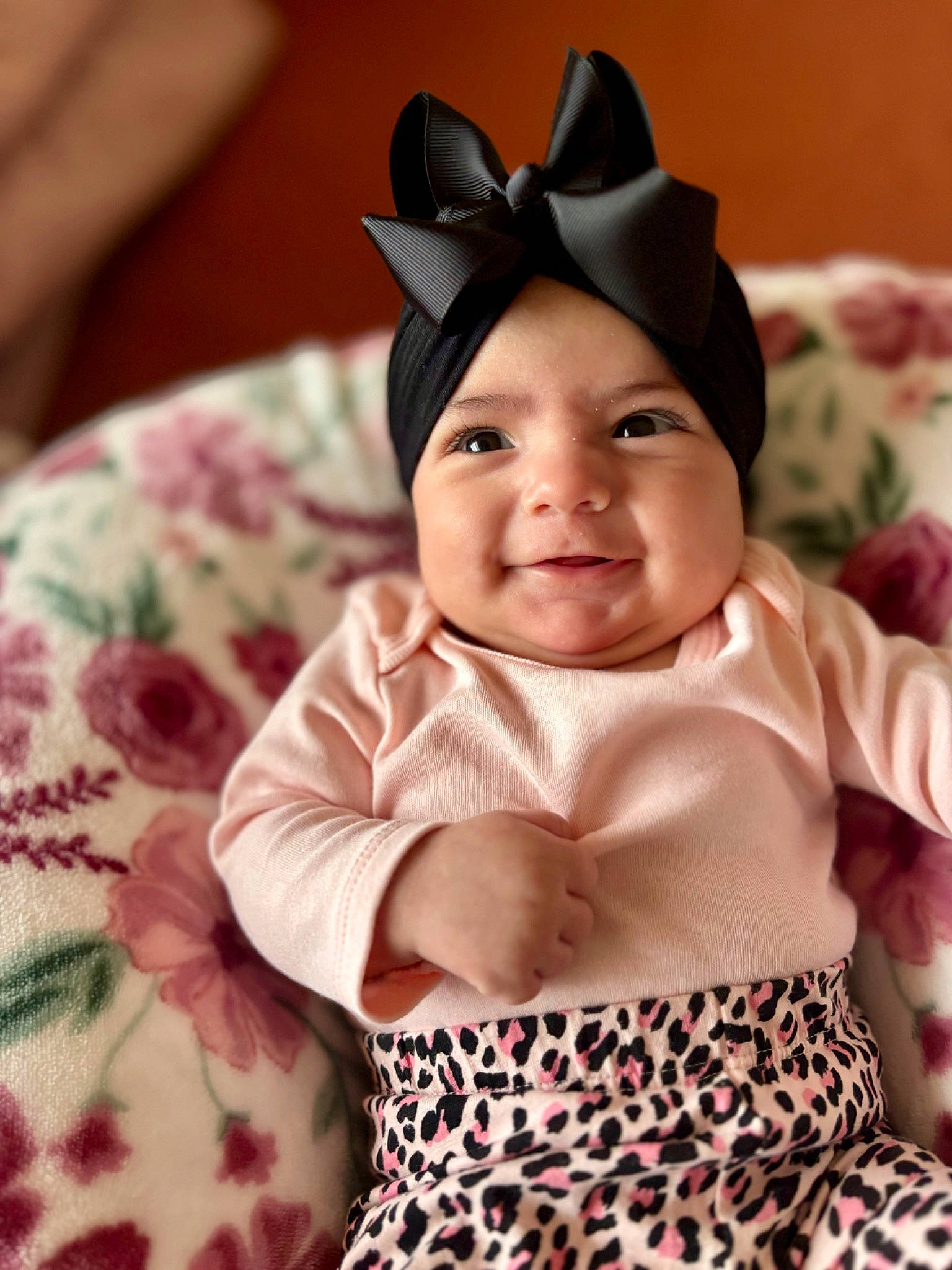 Ellie joined the competition — help win amazing prizes! baby, baby_toddler_clothing, cap, child, chin, comfort, costume_hat, eye, face, hairstyle, happy, head, headgear, headwear, linens, person, pink, skin, sleeve, smile