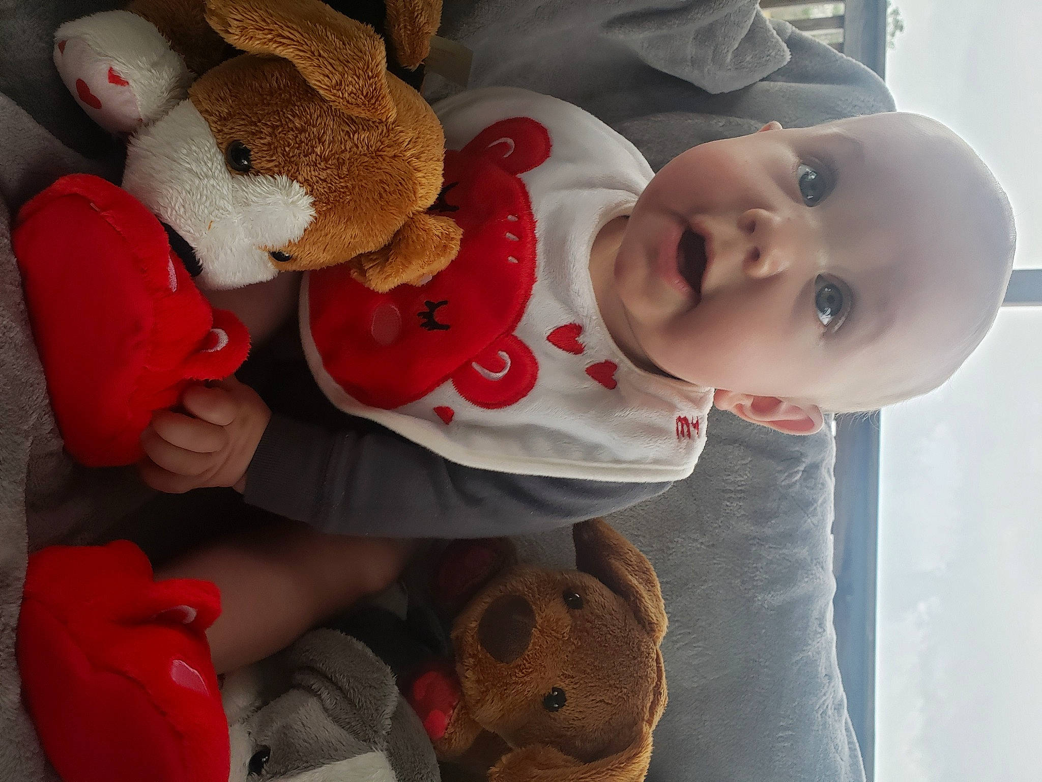 Benton is registered to the contest to win money with this photo: baby, baby_products, baby_sleeping, baby_toddler_clothing, baby_toys, carmine, child, comfort, happy, hat, headgear, mammal, person, plush, room, stuffed_toy, teddy_bear, textile, toddler, toy