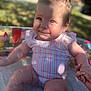 Mia joined the competition — help win amazing prizes! baby, child, water, pool, swimsuit, striped_clothing, hand_holding, outdoor, sunlight, smiling, cute, happy, sitting, skin, face, legs, summer, play, infant, person