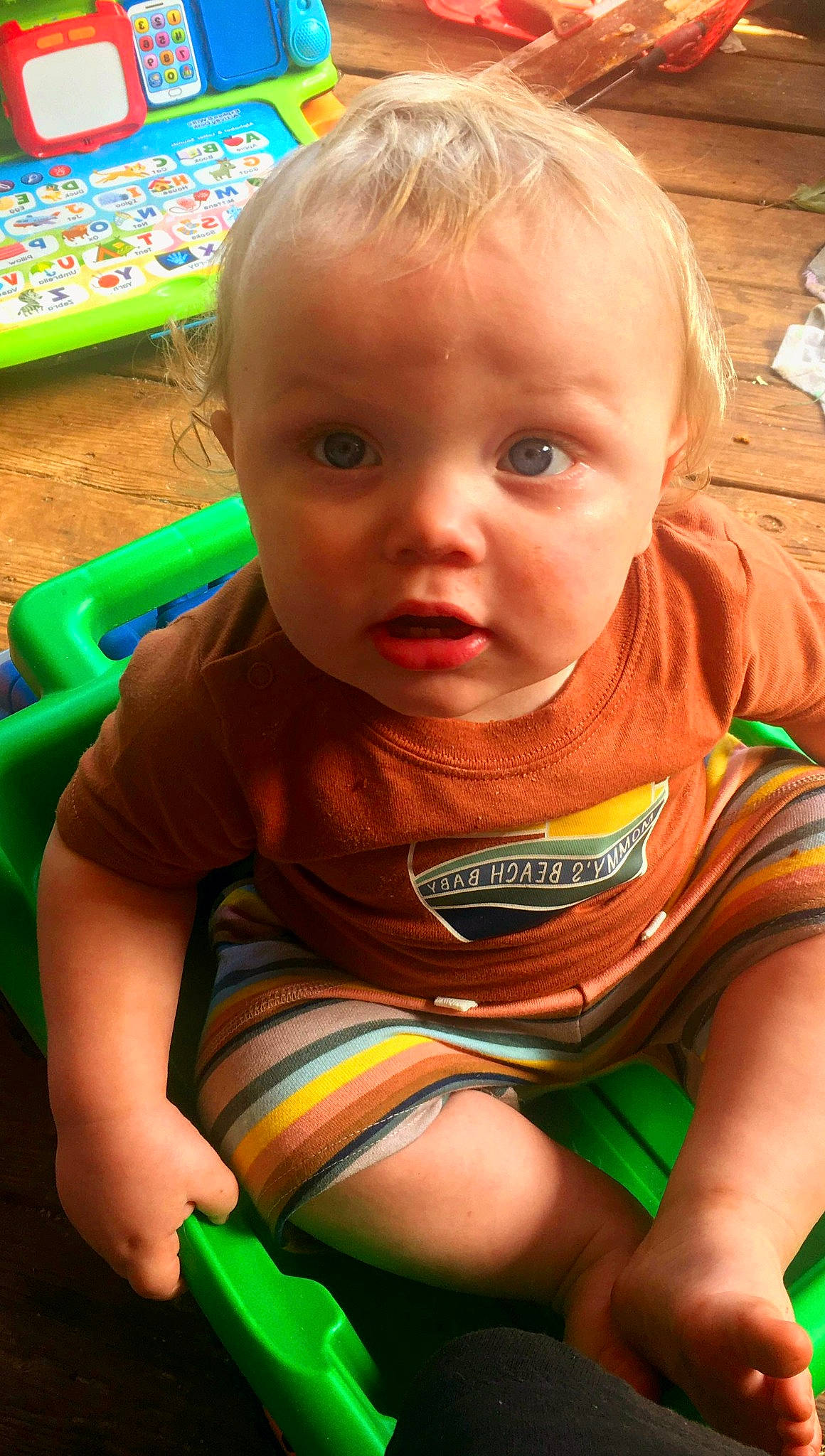 Joseph is registered to the contest to win money with this photo: baby, baby_toddler_clothing, cheek, chin, eye, eyebrow, forehead, grass, green, hair, happy, human_body, iris, lip, mouth, neck, nose, person, skin, sleeve