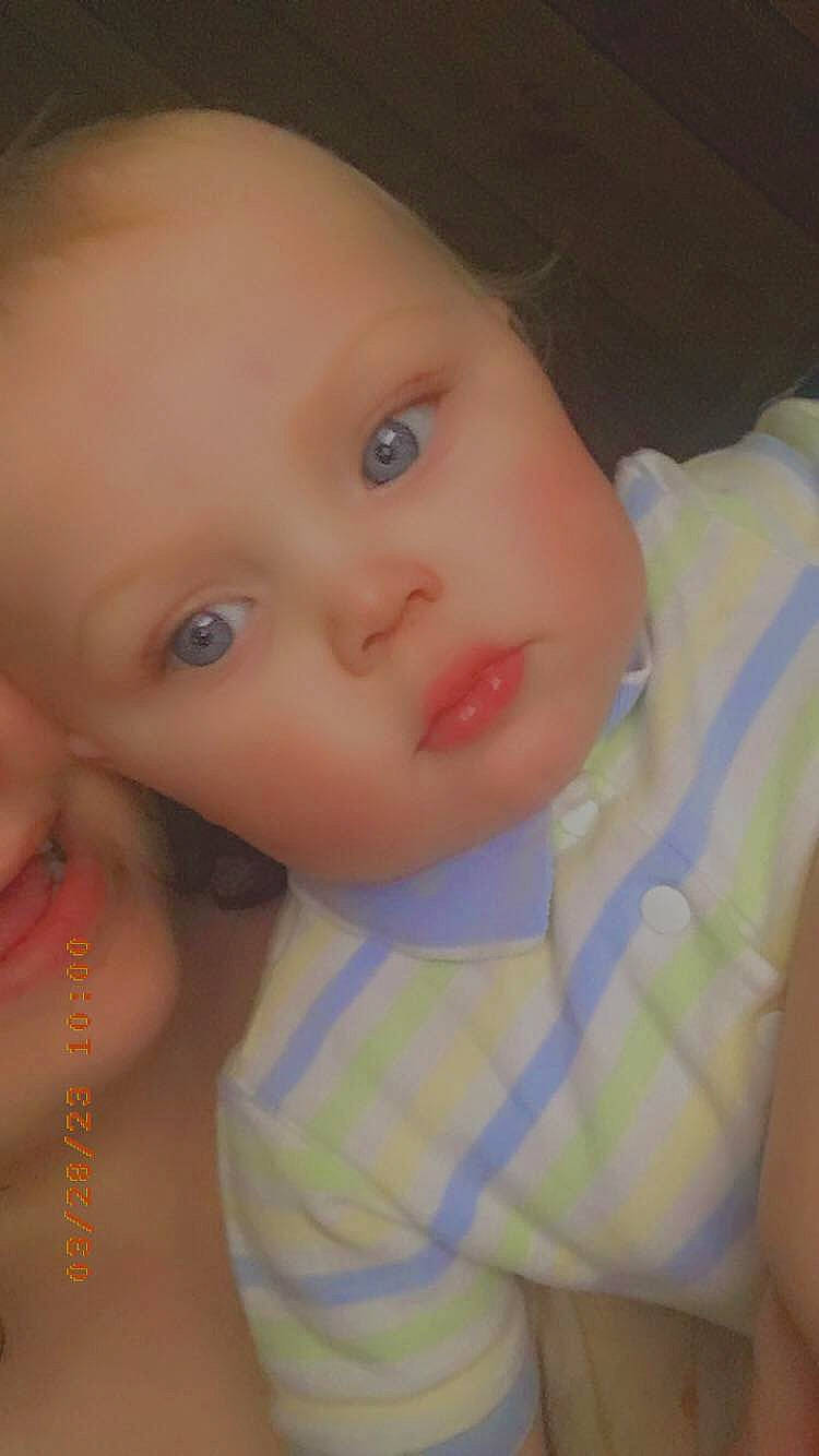 Joseph is registered to the contest to win money with this photo: baby, baby_toddler_clothing, cheek, chest, child, close_up, ear, eye, eyelash, fun, happy, human_body, iris, lip, mouth, nose, pattern, person, skin, sleeve